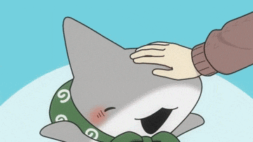 A Person Is Petting A Shark With A Bandana On Its Head GIF