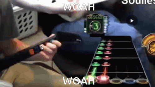 A Person Is Playing A Guitar With The Words Woah On The Bottom GIF