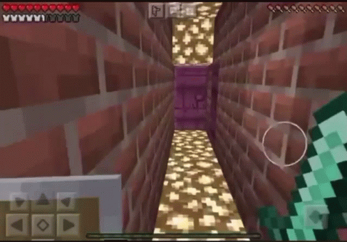 A Person Is Playing A Video Game Called Minecraft On Their Phone GIF