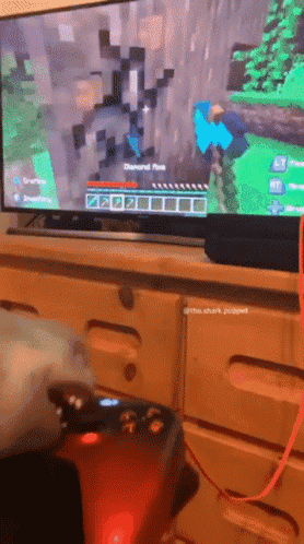 A Person Is Playing A Video Game On A Television GIF