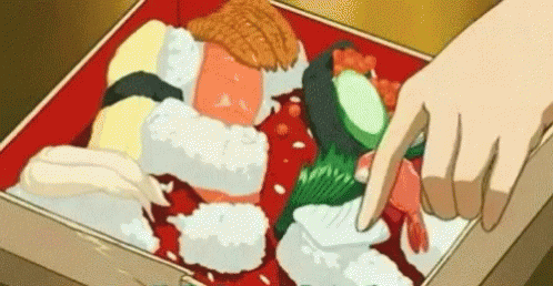 A Person Is Pointing At A Box Of Sushi With A Finger . GIF