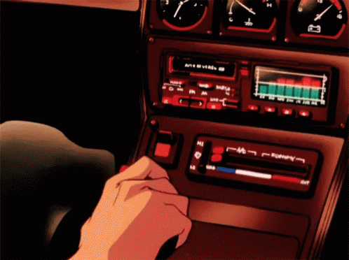 A Person Is Pressing A Button On A Car Radio That Says ' A ' On It GIF