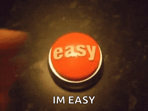 A Person Is Pressing A Red Button With The Word Easy On It GIF