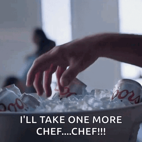 A Person Is Reaching Into A Bucket Of Ice With A Can Of Coors Light In It GIF