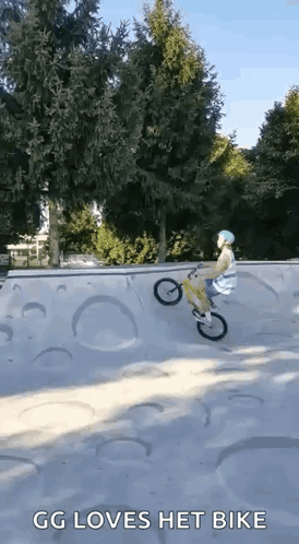A Person Is Riding A Bike On A Ramp At A Skate Park And The Caption Says Gg Loves Het Bike . GIF