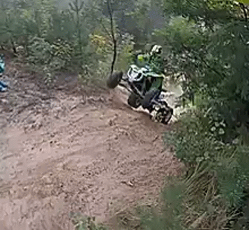 Person Riding Dirt Bike On Dirt Road GIF