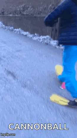 A Person Is Riding A Skateboard Down A Snowy Road With The Words Cannonball Below Them GIF