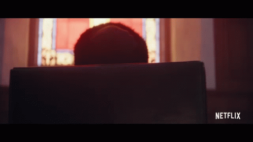 A Person Is Sitting In Front Of A Laptop With Netflix Written On The Bottom Right GIF