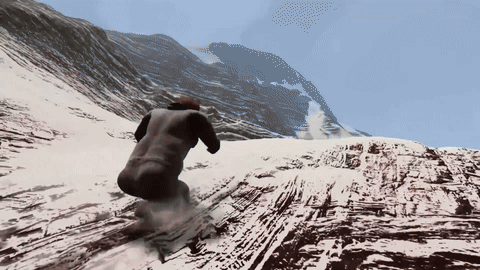 A Person Is Skiing Down A Snow Covered Hill GIF