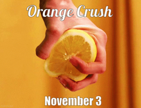 A Person Is Squeezing A Lemon With The Date November 3 On The Bottom GIF