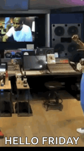 A Person Is Standing In A Room With The Words Hello Friday Written On It GIF
