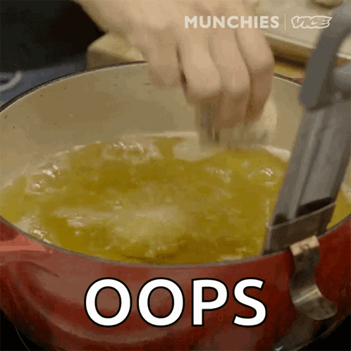 A Person Is Stirring Something In A Pot With The Word Oops Written On It GIF