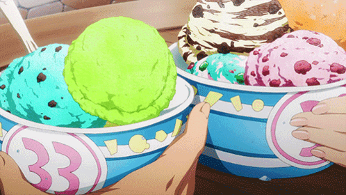 A Person Is Taking A Scoop Of Ice Cream From A Bowl With The Number 33 On It GIF