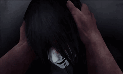 A Person Is Touching A Woman 'S Head With Their Hand GIF
