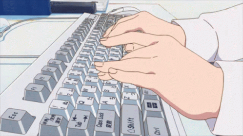 A Person Is Typing On A Keyboard With The Esc Key In The Middle GIF