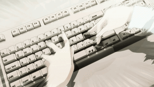 A Person Is Typing On A Keyboard With The Shift Key On The Bottom Left GIF