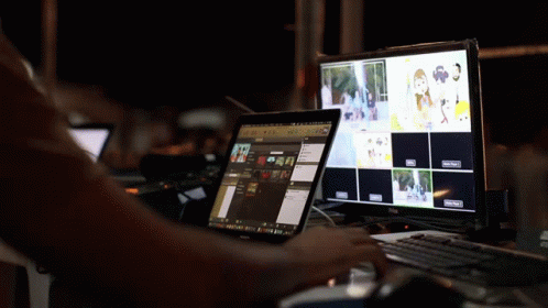 A Person Is Using A Dell Computer And A Dell Tablet GIF