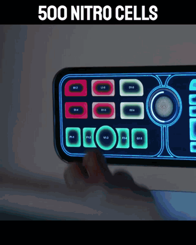 A Person Is Using A Remote Control With The Words 500 Nitro Cells Written Above It GIF