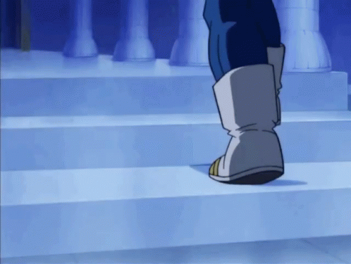 A Person Is Walking Down A Set Of Stairs GIF