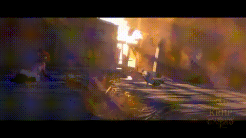 A Person Is Walking Down A Street In Front Of A Building . GIF