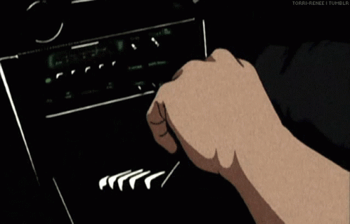 A Person Is Wearing A Pair Of Black And White Sneakers With The Letter N On The Side . GIF