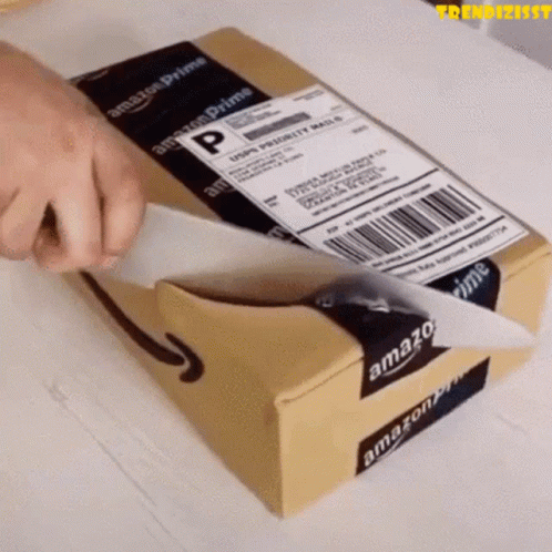 A Person Is Wrapping An Amazon Prime Package GIF
