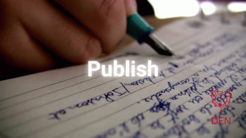 A Person Is Writing On A Piece Of Paper With The Word Publish Written On It GIF