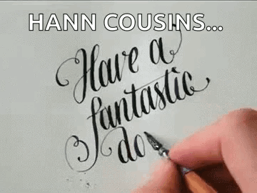 A Person Is Writing The Words `` Hann Cousins ... Have A Fantastic Day '' With A Pen On A Piece Of Paper . GIF