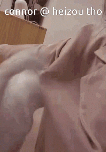 A Person Laying On A Bed With The Words Connor @ Heizou Tho Written On The Top GIF