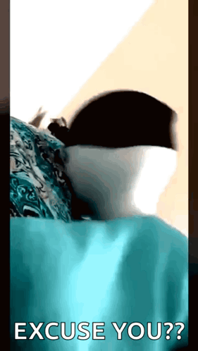 A Person Laying On A Bed With The Words Excuse You GIF