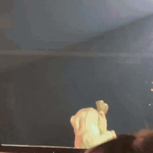 A Person Laying On Their Back With Their Legs Up GIF