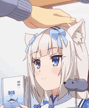 A Person Petting A Cat Girl 'S Head While She Holds A Book With A Fish On It GIF