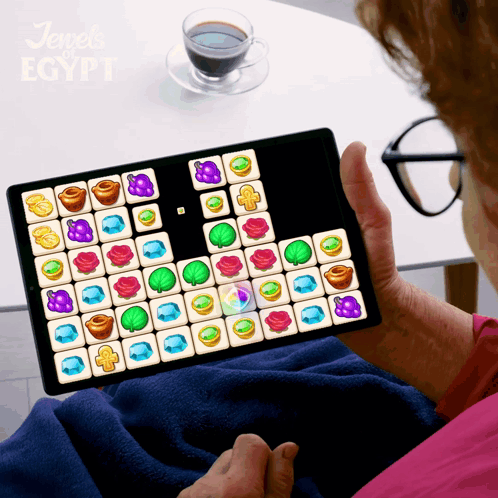 A Person Playing A Game Called Jewels Of Egypt On A Tablet GIF