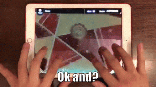 A Person Playing A Game On A Tablet With The Words Ok And Written On The Screen GIF