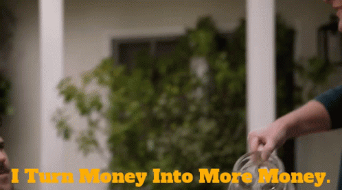 A Person Pouring Money Into A Glass With The Words I Turn Money Into More Money Below Them GIF