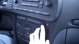 A Person Pressing A Button On A Car Dashboard GIF