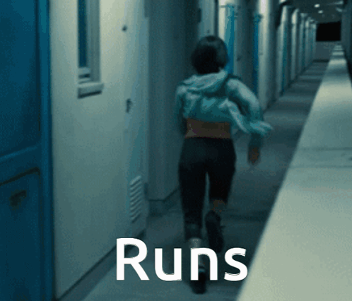 A Person Running Down A Hallway With The Word Runs Written On The Bottom GIF