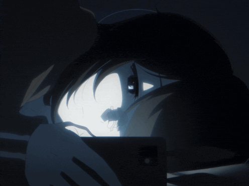 A Person 'S Face Is Shown In The Dark With A Light Coming Out Of It GIF