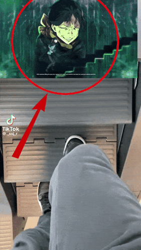 A Person 'S Feet Are Shown In Front Of A Picture Of A Man With A Mask On His Face GIF