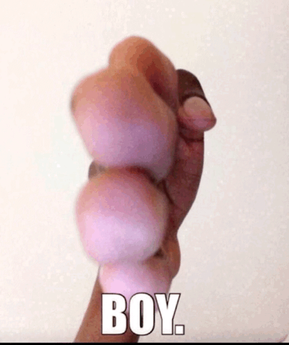 A Person 'S Hand Is Holding A Ball And The Word Boy Is On The Bottom GIF