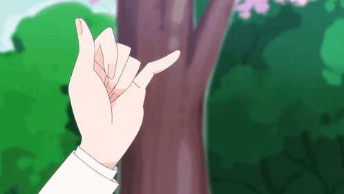 A Person 'S Hand Is Making A Peace Sign GIF