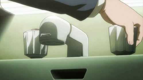 A Person 'S Hand Is Reaching Into A Sink To Turn The Faucet On GIF