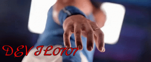 A Person 'S Hand Is Reaching Out Towards Another Person 'S Hand With Devjl0707 Written In Red On The Bottom GIF