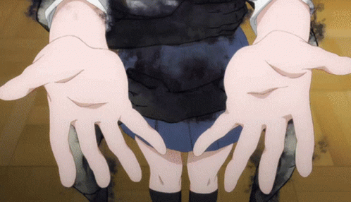 A Person 'S Hands Are Spread Out In Front Of A Black Background GIF