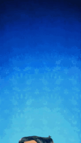 A Person 'S Head Is Against A Blue Sky With Clouds GIF