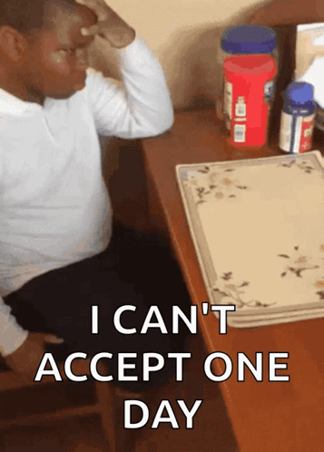 Person Sitting At Table With I Cant Accept One Day Text GIF