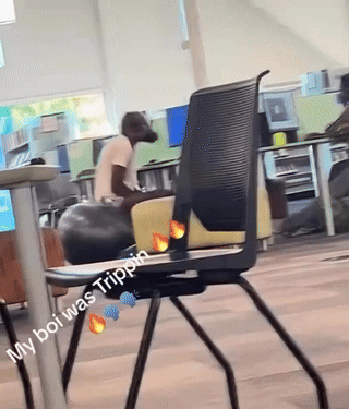 A Person Sitting On A Chair With The Words My Boi Was Trippin On The Bottom GIF