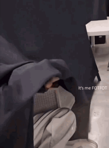 a person sitting under a blanket with the words it 's me fotfot written below them