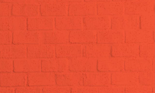 A Person Spray Paints The Words " We Can 'T Breathe " On A Brick Wall GIF