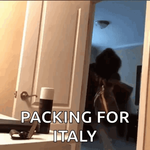 A Person Standing In A Doorway With The Words " Packing For Italy " On The Bottom GIF